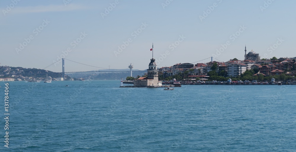 Maiden's Tower - also known as Kizkulesi or Leandertower - in Istanbul, Turkey with Bosphorus Bridge