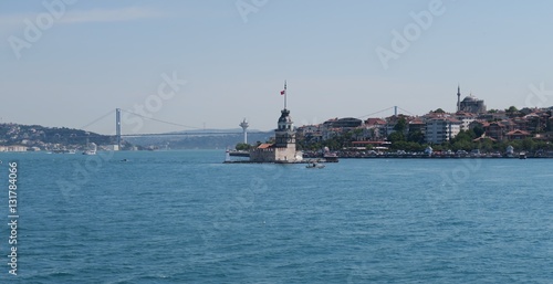 Maiden's Tower - also known as Kizkulesi or Leandertower - in Istanbul, Turkey with Bosphorus Bridge