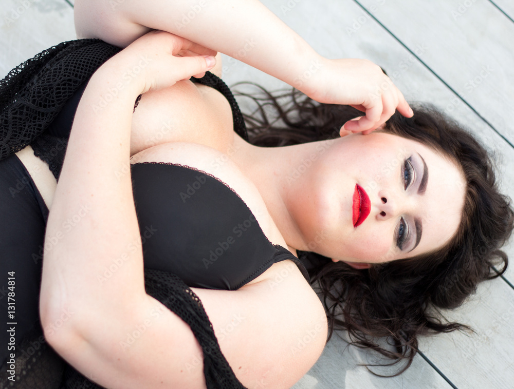 Young beautiful plus size model with big breast, black bra Stock Photo