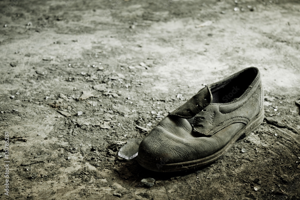 Dusty old shoe abandoned in the ruins Stock Photo Adobe Stock