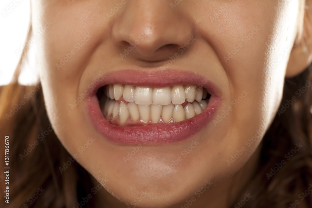 young woman shows her beautiful and healthy teeth young woman shows her beautiful and healthy teeth