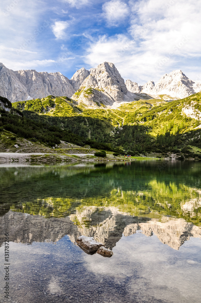 Beautiful view of Seebensee lake and Vorderer Drachenkopf mountain (2302m amsl) near Zugspitze in the state of Tirol / Tyrol in Austria.The lake is a popular hiking destination for tourists.