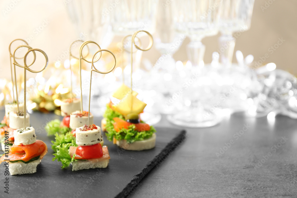 Assorted canapes on table closeup Assorted canapes on table closeup