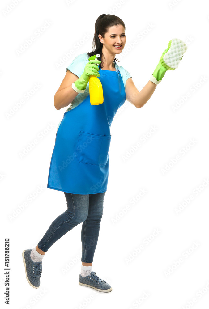 Young cleaner with sponge and spray on white background Young cleaner with sponge and spray on white background