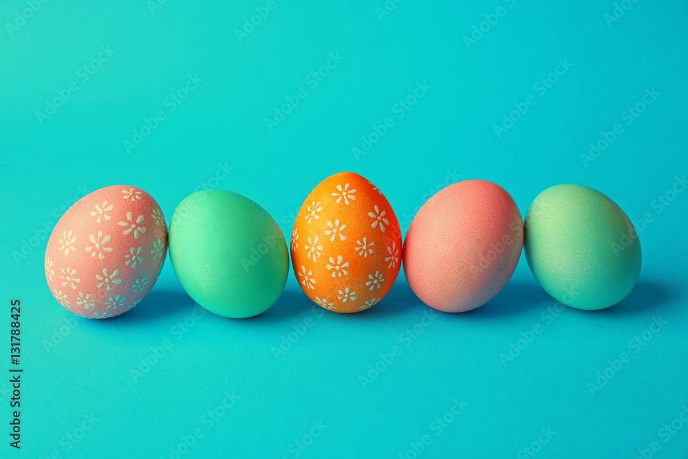 Colorful Easter eggs on blue background Colorful Easter eggs on blue background