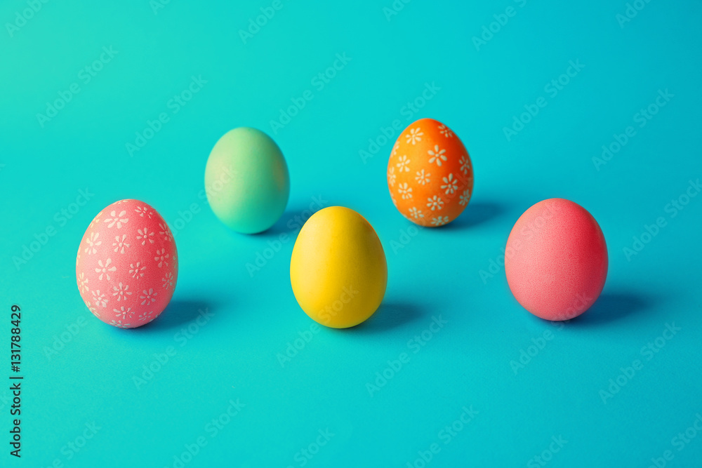 Colorful Easter eggs on blue background Colorful Easter eggs on blue background
