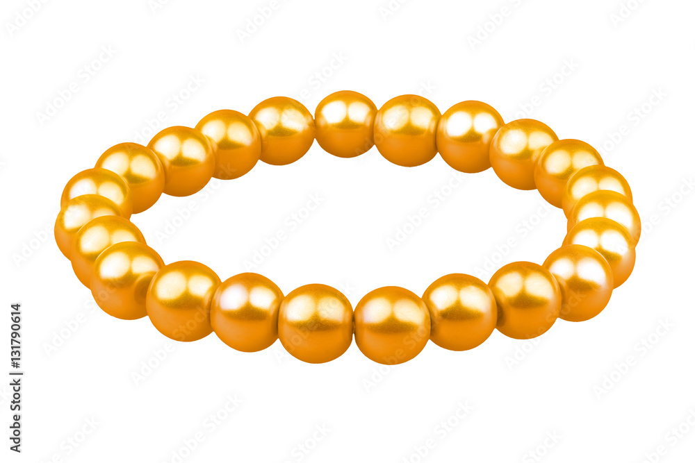 Gold elastic bracelet made of medium pearl-like round beads, isolated on white background, clipping path included Gold elastic bracelet made of medium pearl-like round beads, isolated on white background, clipping path included