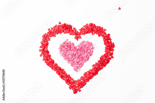 pink heart frame red heart on a white background and one little heart. Festive background for Valentine s day  birthday  wedding  holiday