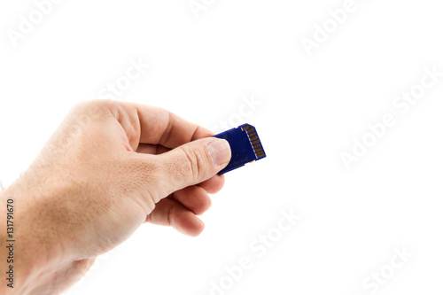 man hand holding memory card isolated on white background