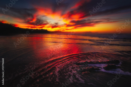 red sunset of Sopelana beach