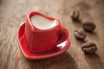 Leinwandbilder Kaffee Bar Herzförmige Kaffeetasse für Verliebte  © pixarno