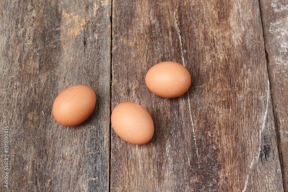  egg on wood background. Top view