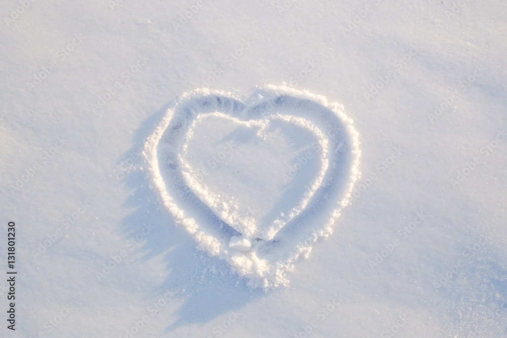 drawn heart on the snow