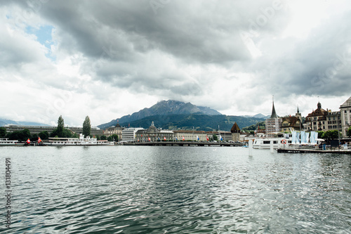 Travel in Switzerland. Beautiful view on lake in Lucerne, city and mountain. Tourism