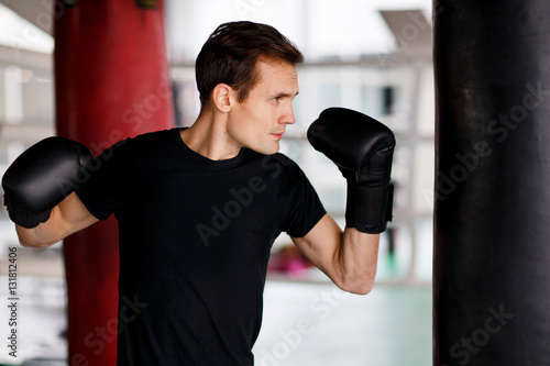 Sportsman engaged in boxing gloves