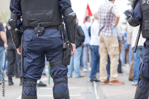 Police officers at street protest. Law enforcement.