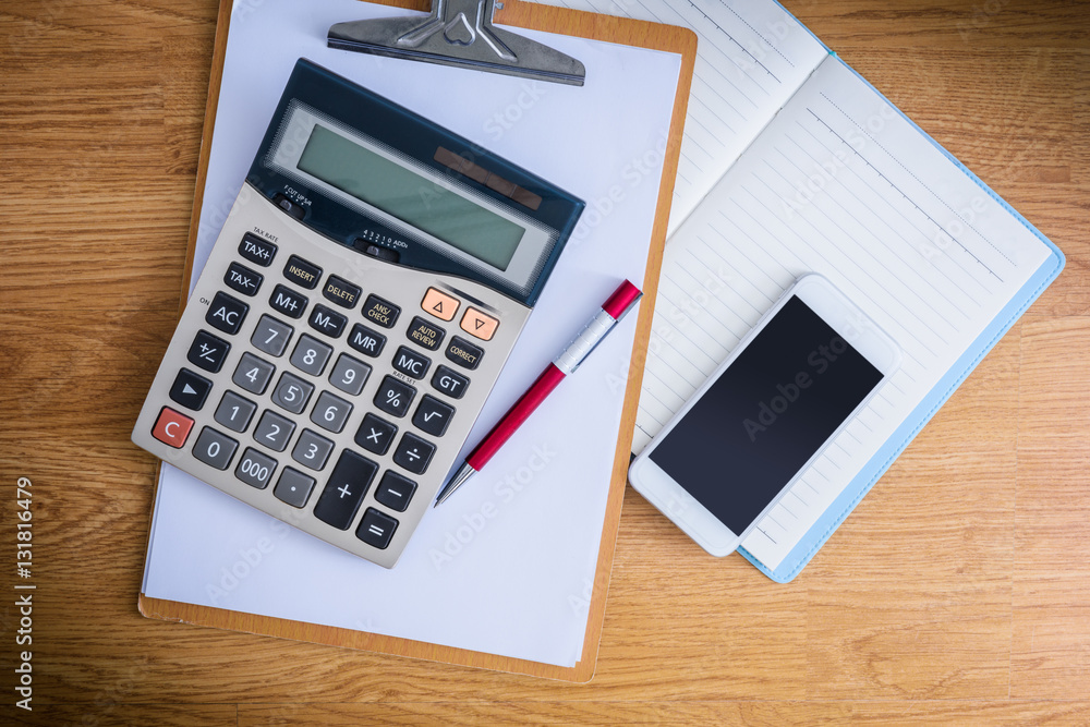 clipboard with a pen and notebook, calculator clipboard with a pen and notebook, calculator