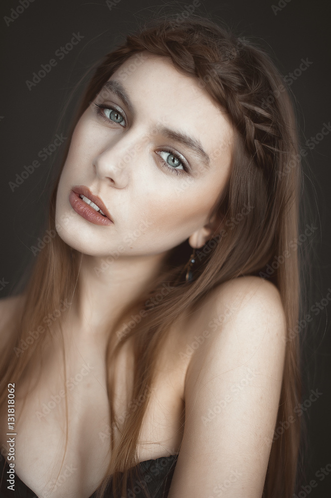 Portrait of beautiful sensual woman with elegant hairstyle. Even Portrait of beautiful sensual woman with elegant hairstyle. Even