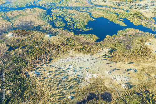 Okavango delta (or Okavango Grassland) is one of the Seven Natural Wonders of Africa (view from the airplane) - Botswana photo