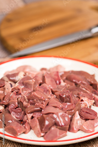 Closeup macro sliced chicken liver on the plate