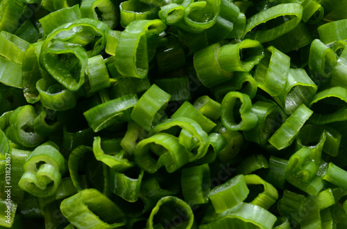Closeup view of sliced, chopped spring onions, salad onions, green onions or scallions