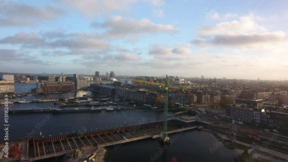 Amsterdam skyline from river IJ, aerial. Amsterdam skyline from river IJ, aerial.