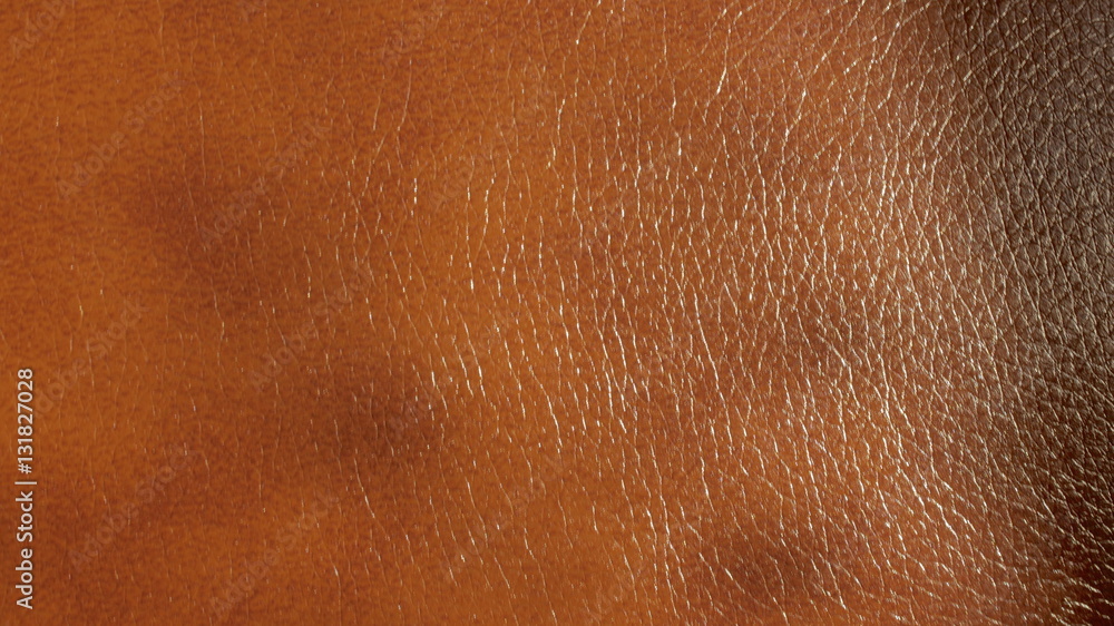 Fototapeta premium closeup detail of orange leather texture background.