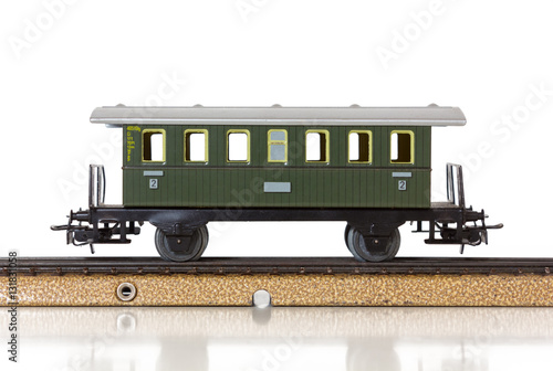 Model Train's Vintage Passenger Car on the Rails