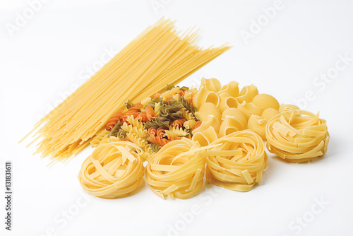 Different types of dried pasta. Horizontal studio shot.
