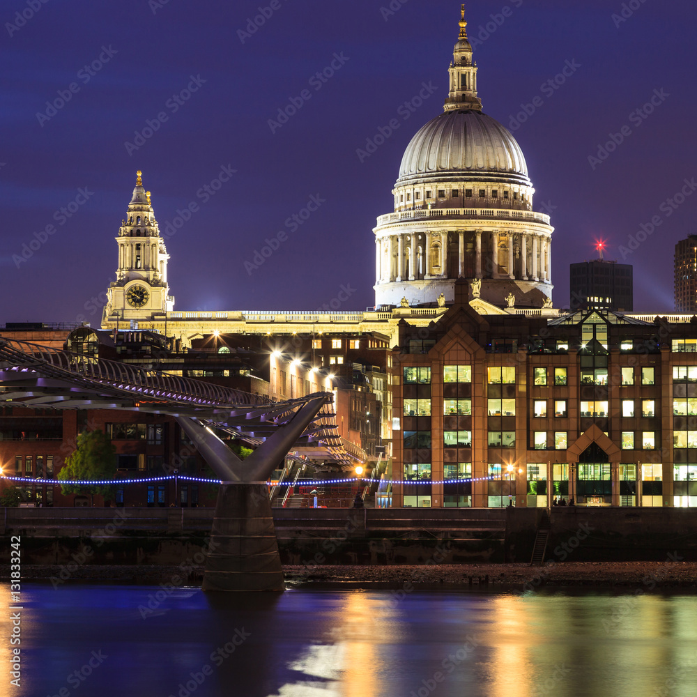 Millennium Bridge leading to Saint Paul's Cathedral during sunset