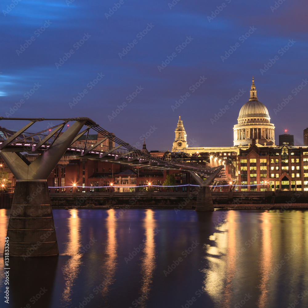 Millennium Bridge leading to Saint Paul's Cathedral during sunset
