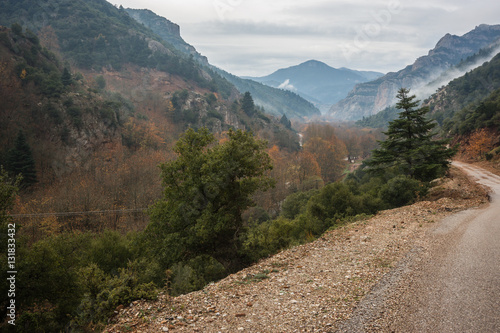 Scenic foggy autumn landscape in mountains near Kalavrita, Pelop photo