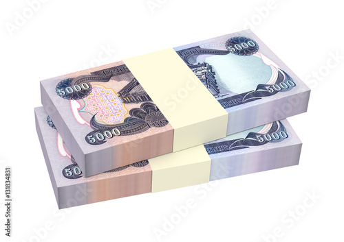 Iraqi dinars bills isolated on white background. 3D illustration.