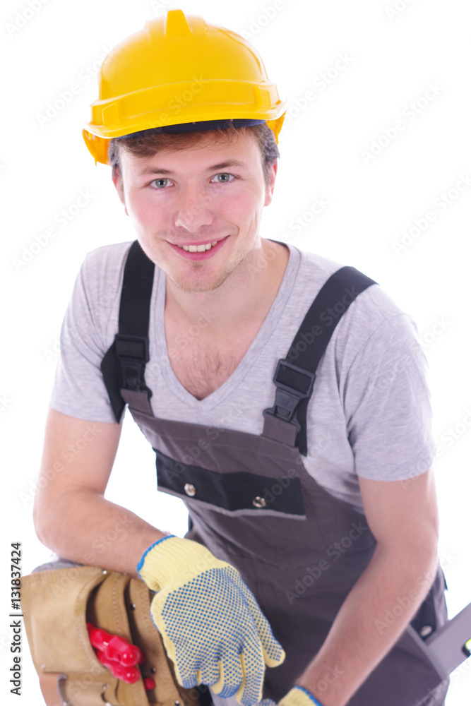 sympathischer Handwerker vor weißem Hintergrund sympathischer Handwerker vor weißem Hintergrund