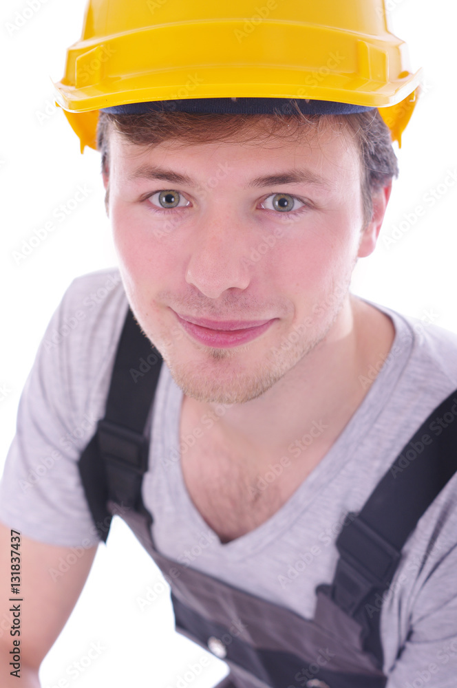 sympathischer Handwerker vor weißem Hintergrund sympathischer Handwerker vor weißem Hintergrund