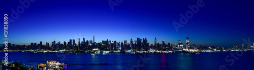 Super wide panorama of New York Manhattan skyline before sunrise © hit1912