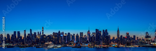 Super wide panorama of New York Manhattan skyline before sunrise
