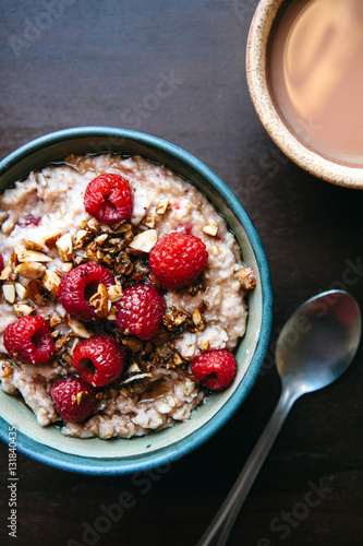 Oatmeal with raspberries in bowl