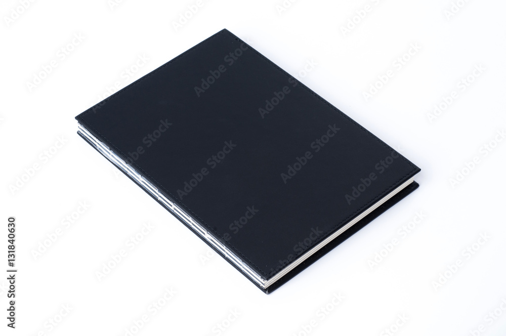 Black notebook on white background. Black notebook on white background.