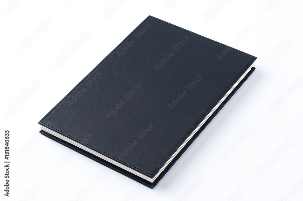 Black notebook on white background. Black notebook on white background.
