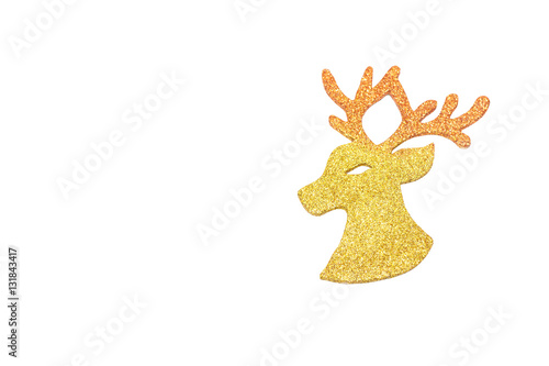 Image of head reindeer hanging on rope over glitter gold backgro