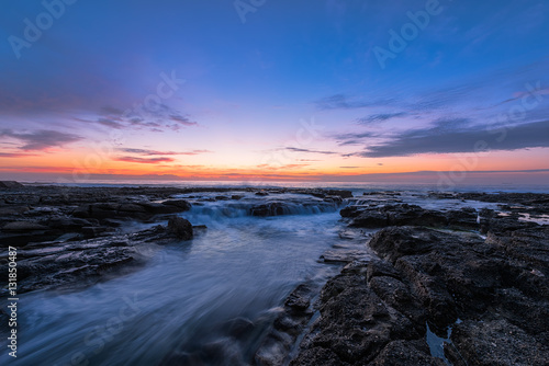 Sunrise on the Bar Beach in Newcastle NSW Australia. © Prakiat