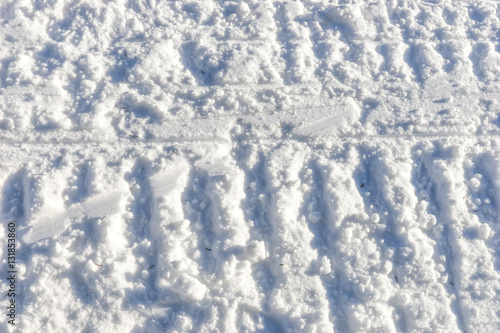 Snowmobile track marks on the snow, snow background