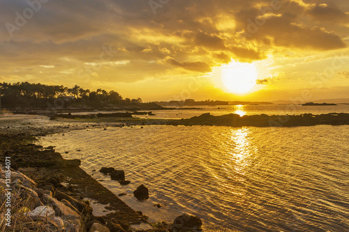 Arousa estuary at golden sunset photo