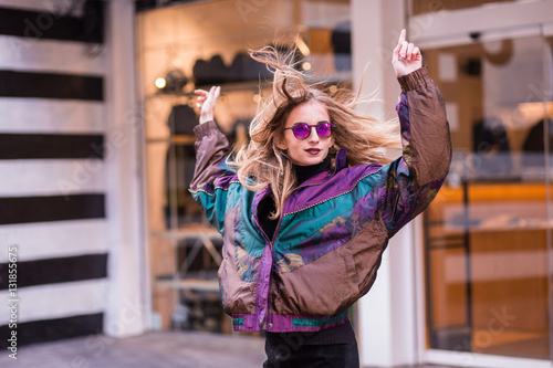 Fashion woman posing on the street photo