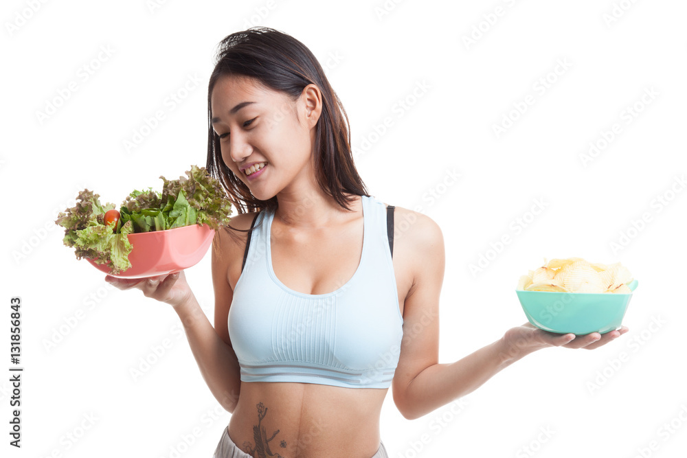 Beautiful Asian healthy girl salad and potato chips. Beautiful Asian healthy girl salad and potato chips.