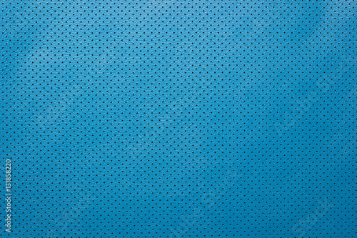 Blue perforated leather background © htoto911