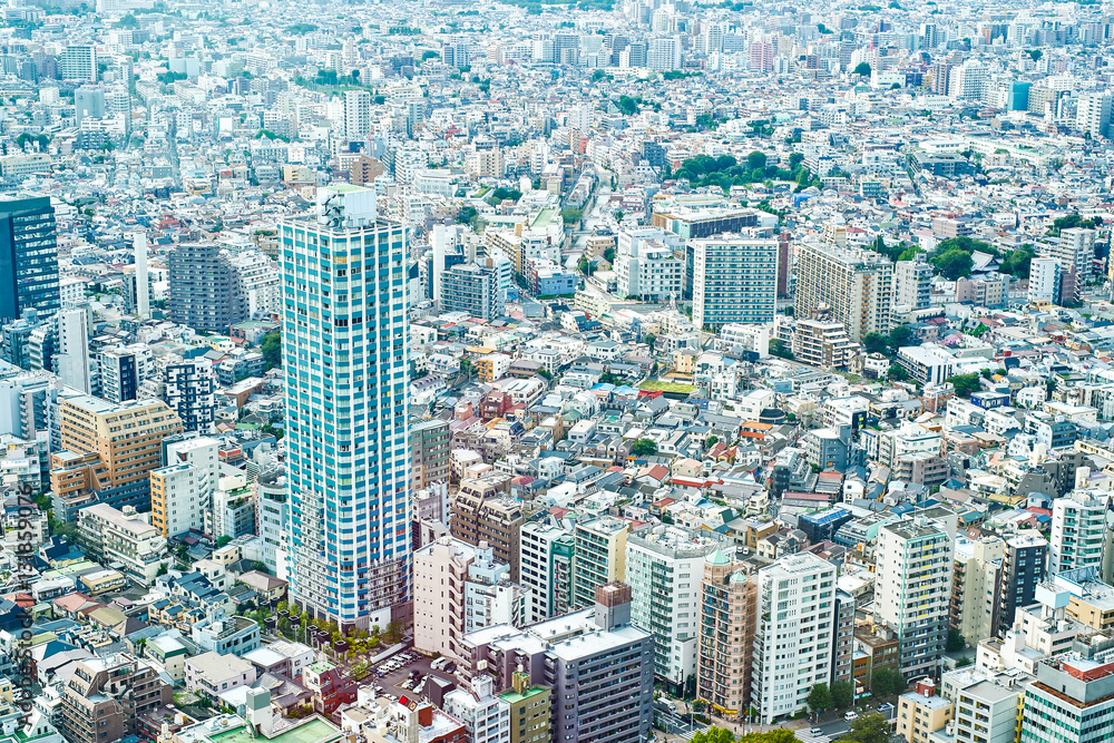 Fototapeta premium Asia Business concept for real estate and corporate construction - panoramic modern cityscape building bird eye aerial view under sunrise and morning blue bright sky in Tokyo, Japan
