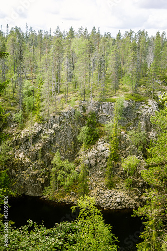 A beautiful lake and forest landscape from Hossa in Finland photo