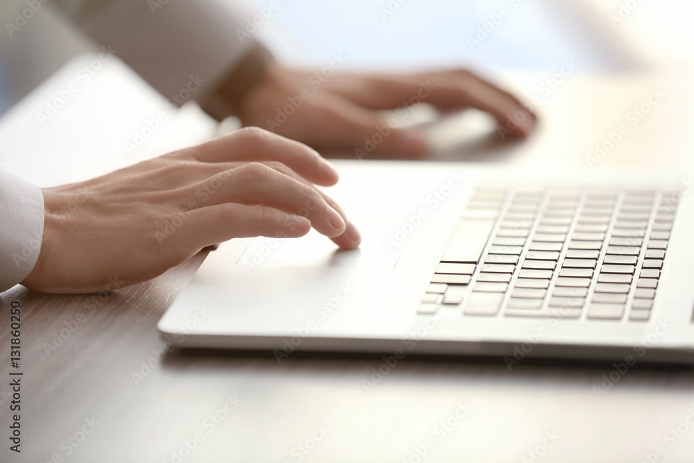 Businessman using laptop, close up Businessman using laptop, close up
